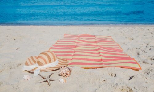 Plaža, peškir, more, vlasnica apartmana